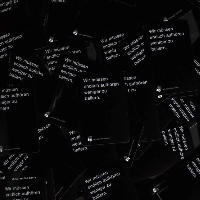 black-trident-cards-against-gun-control-sticker image 1
